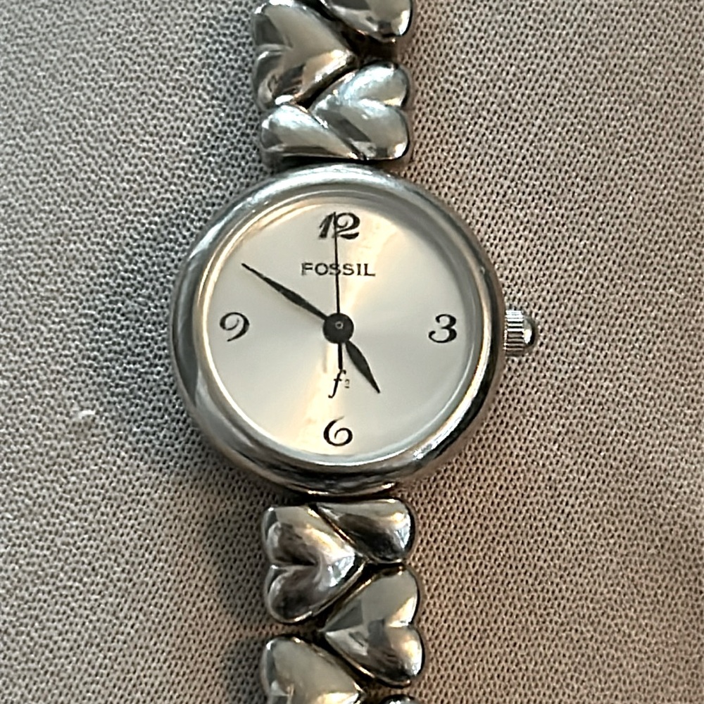 FOSSIL Ladies Stainless F2 Round Face Watch, silver toned watch band.